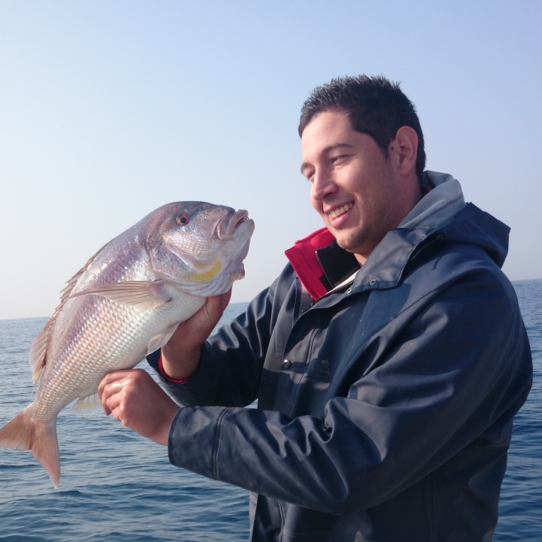 Le pêcheur avec sa prise