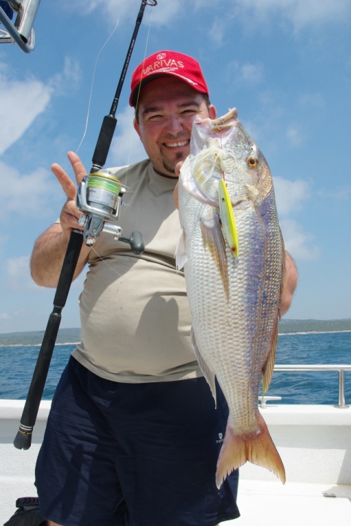 Un pêcheur heureux de sa prise !